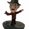 Designer Vinyl>A Nightmare on Elm Street - Freddy Krueger Revos 4” Vinyl Figure