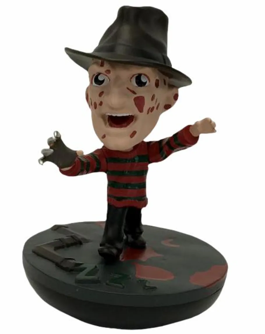 Designer Vinyl>A Nightmare on Elm Street - Freddy Krueger Revos 4” Vinyl Figure